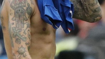 China prohíbe hacerse nuevos tatuajes a los jugadores de la selección